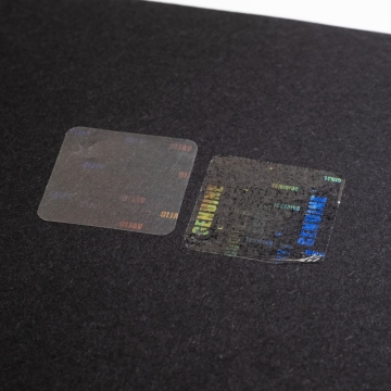 Transparentes Siegelfilm mit dem verdeckten Hologramm Zettel 20x20 mm